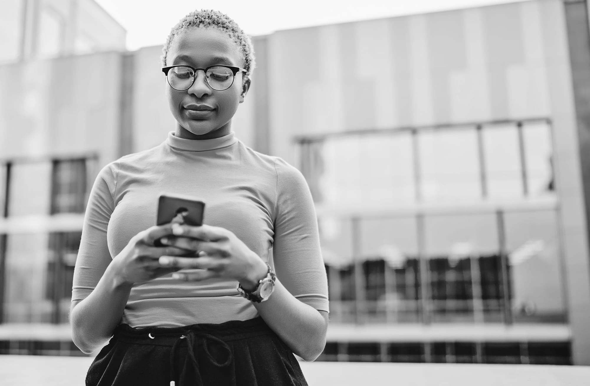 shutterstock_1751360681 Woman texting
